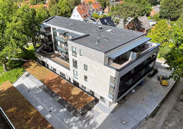 Das Gebäude in Lübeck-Karlshof war das erste Wohnungsbauprojekt der neu aufgestellten Genossenschaft coop. Foto: coop eG